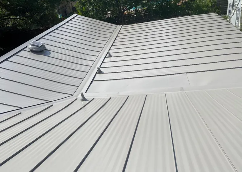 Solar attic fan installed on a metal roof for Roof Ventilation in St. George